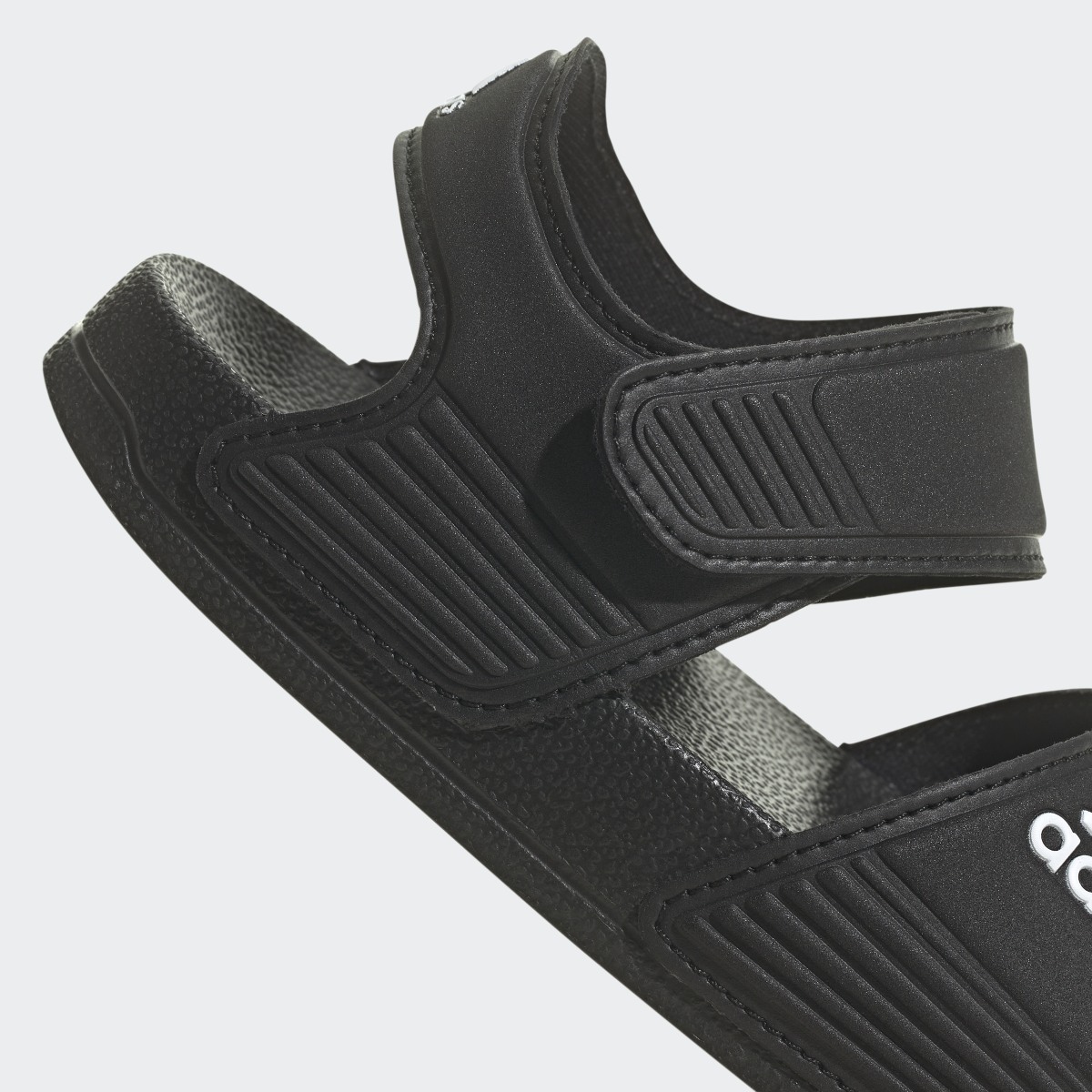 Adidas adilette Sandale. 10