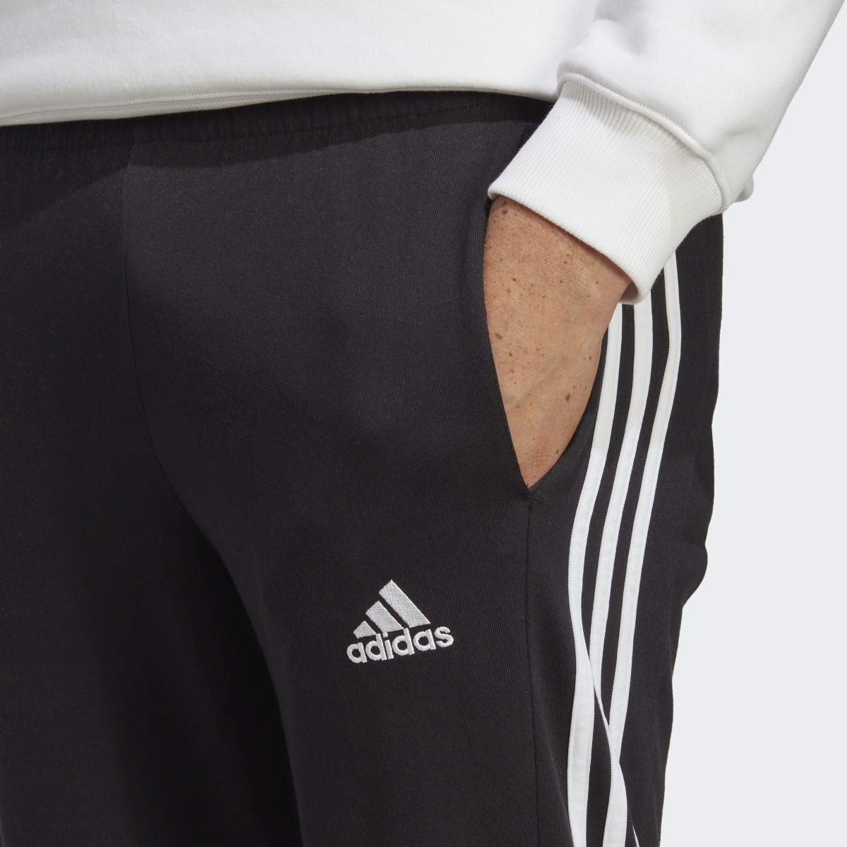 Adidas Essentials Single Jersey Tapered Open Hem 3-Streifen Hose. 5