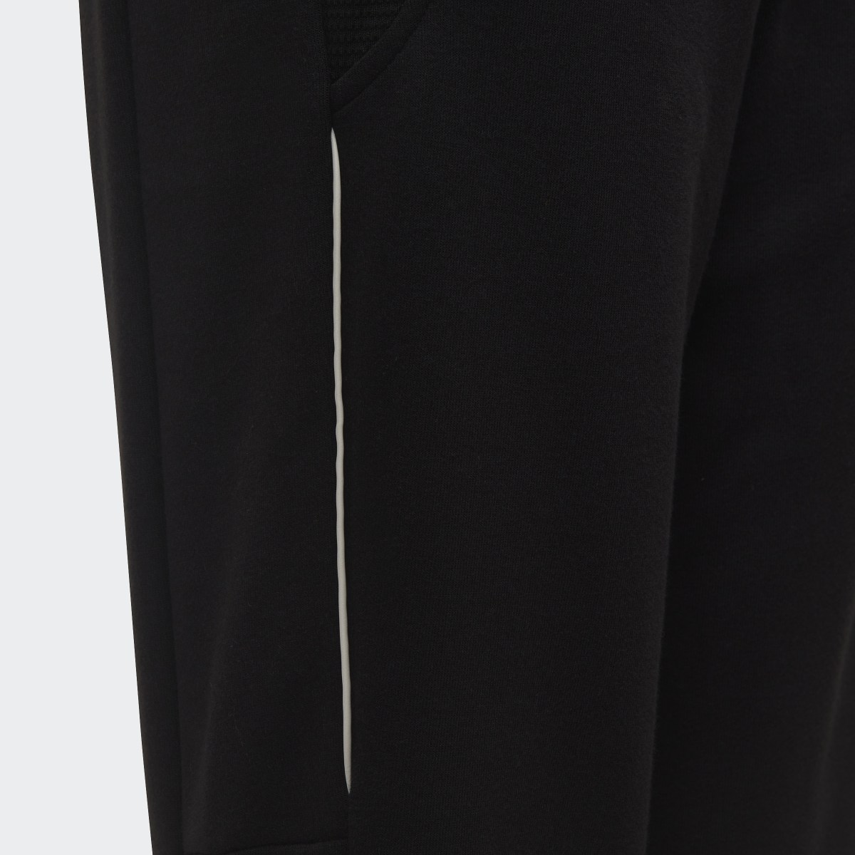 Adidas XFG Slim-Leg Joggers. 4