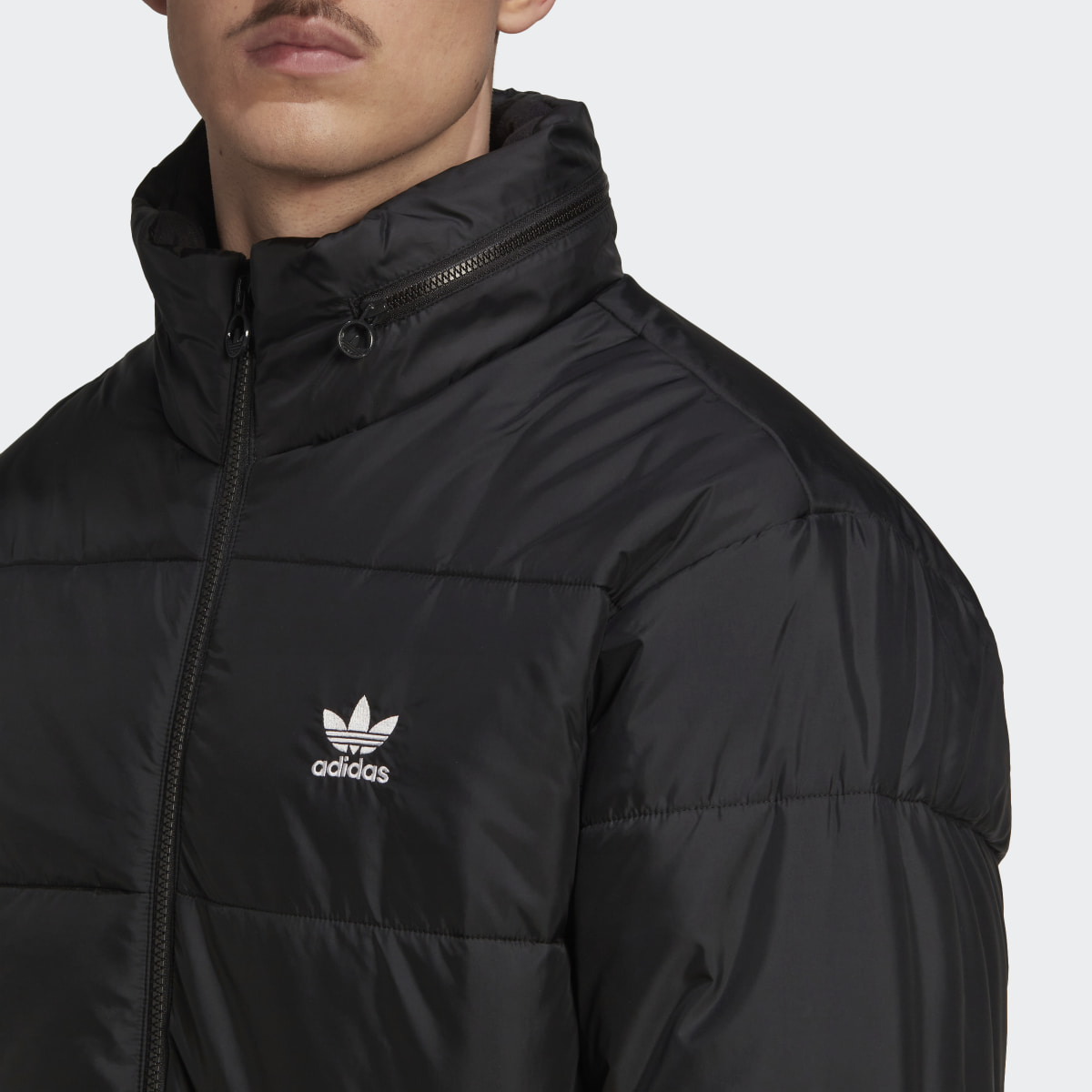 Adidas Chaqueta acolchada Essentials Puffer. 6