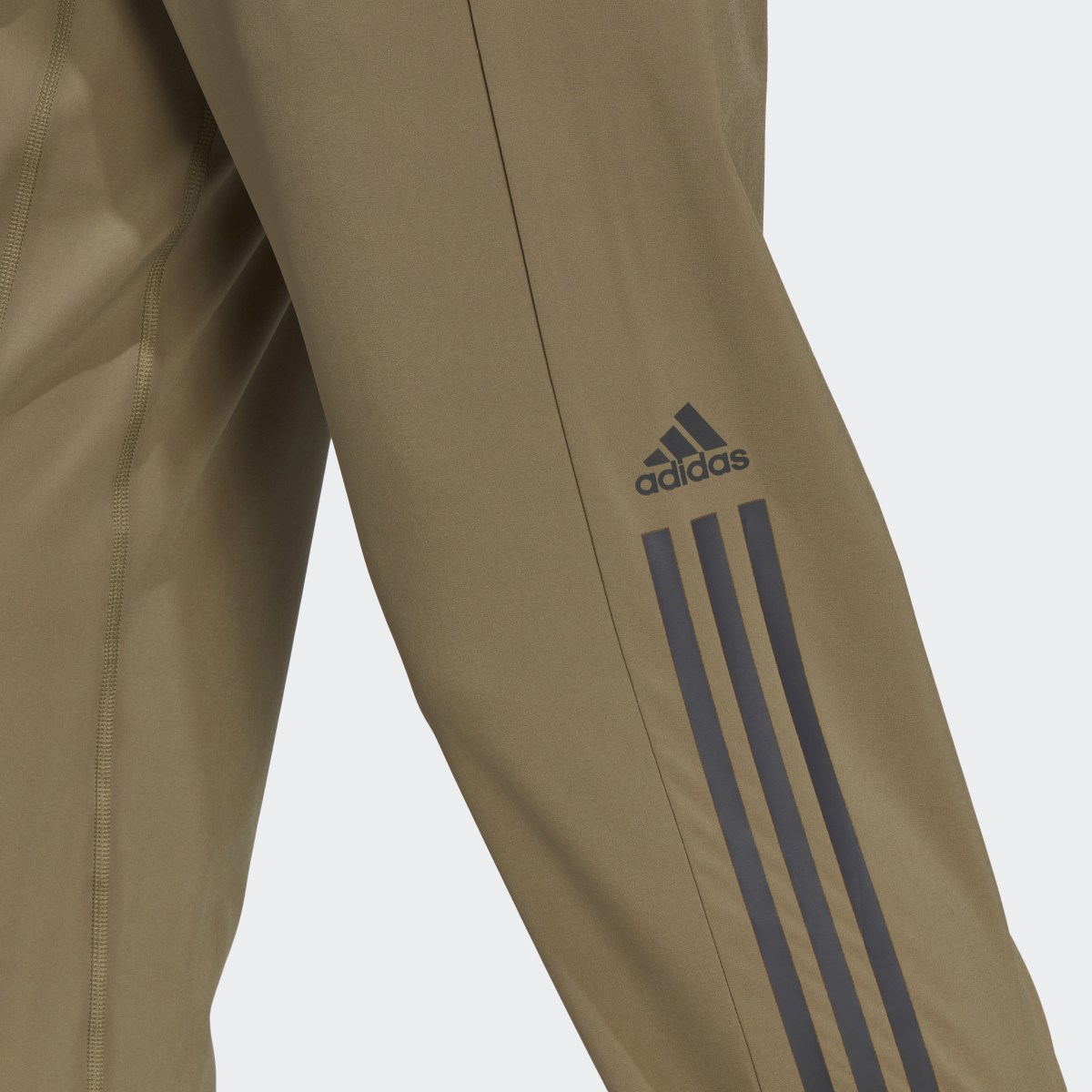 Adidas AlphaStrength Woven Zip Pants. 5
