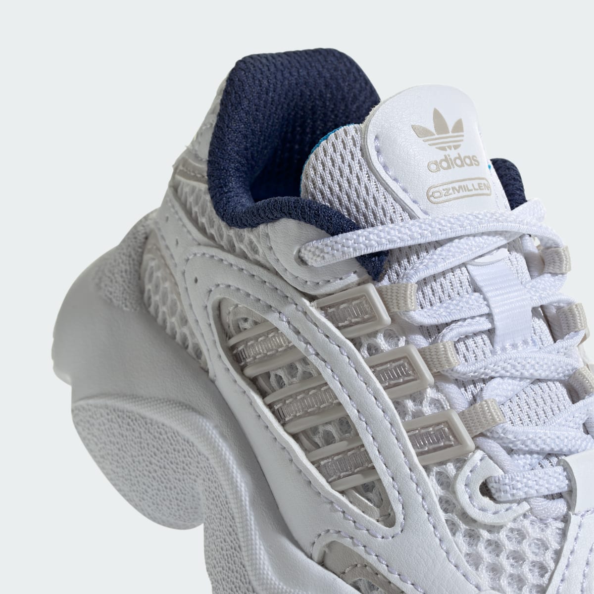 Adidas Chaussure à lacets élastiques OZMILLEN Enfants. 10