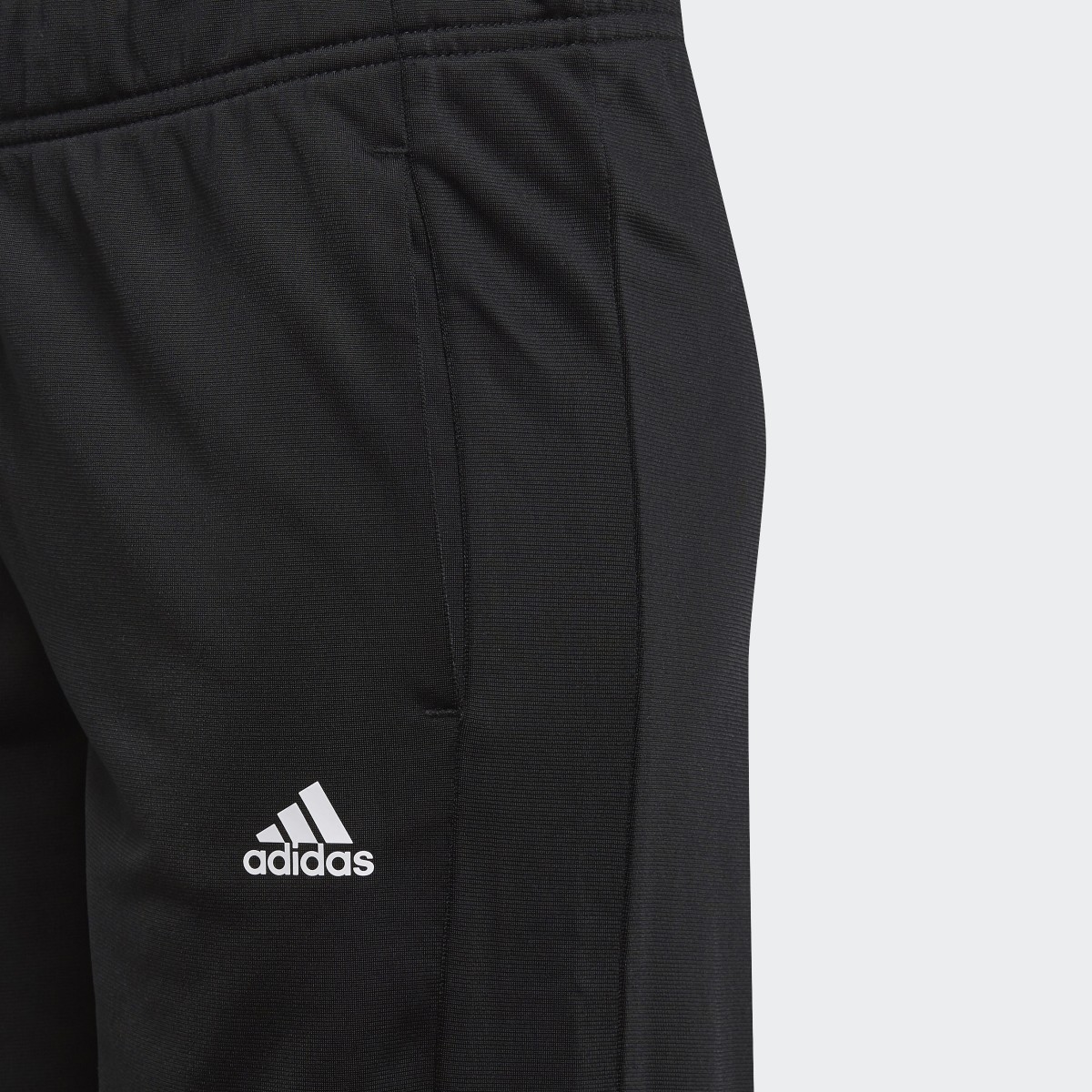 Adidas Essentials Tracksuit. 8