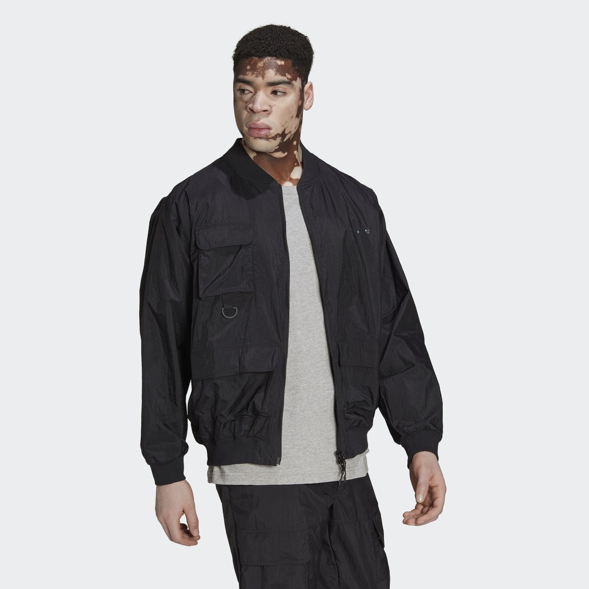 Adidas Reveal Cargo Originals Jacke. 4