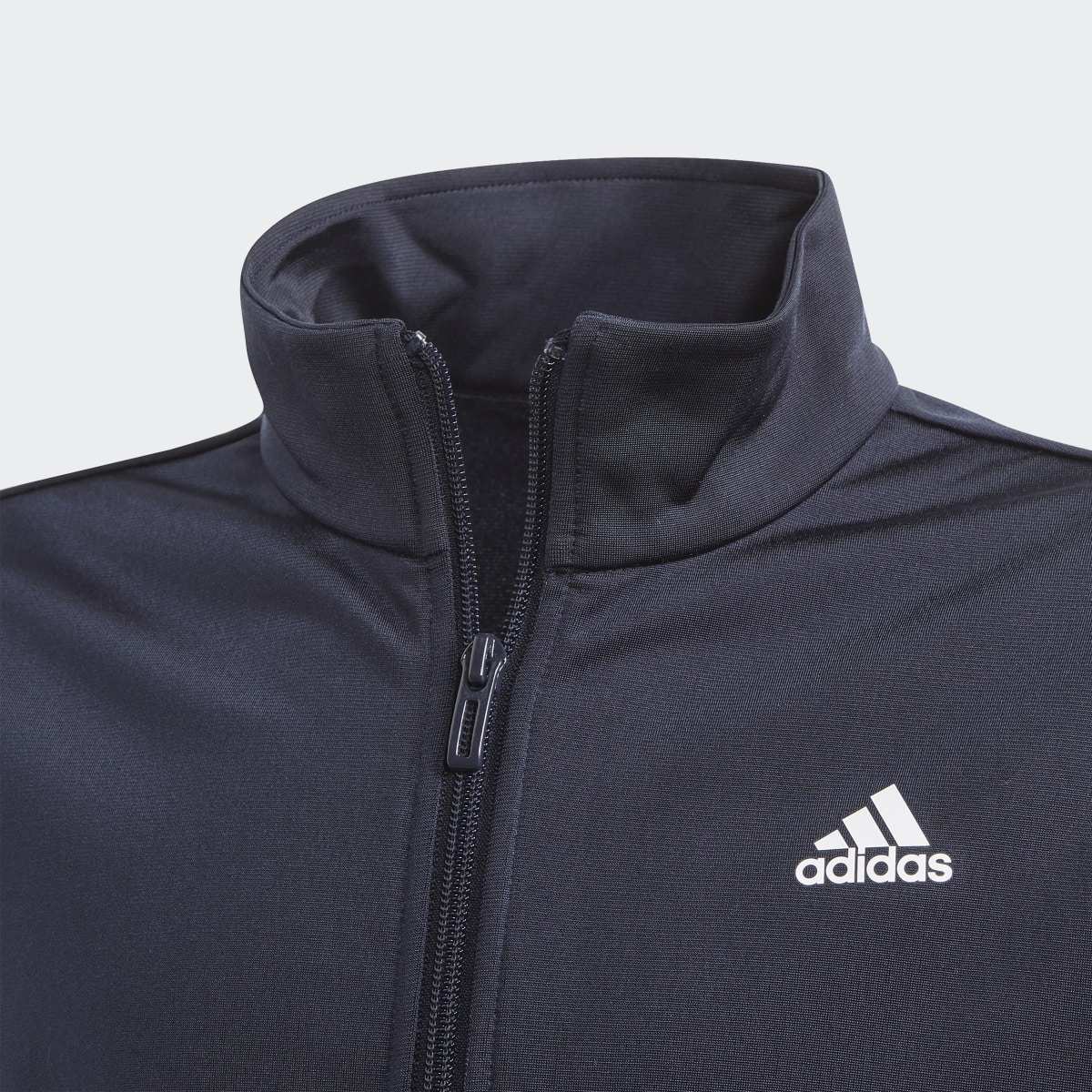 Adidas Essentials Track Suit. 7