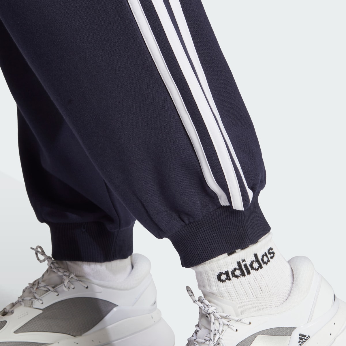 Adidas Essentials 3-Stripes French Terry Loose-Fit Pants. 6