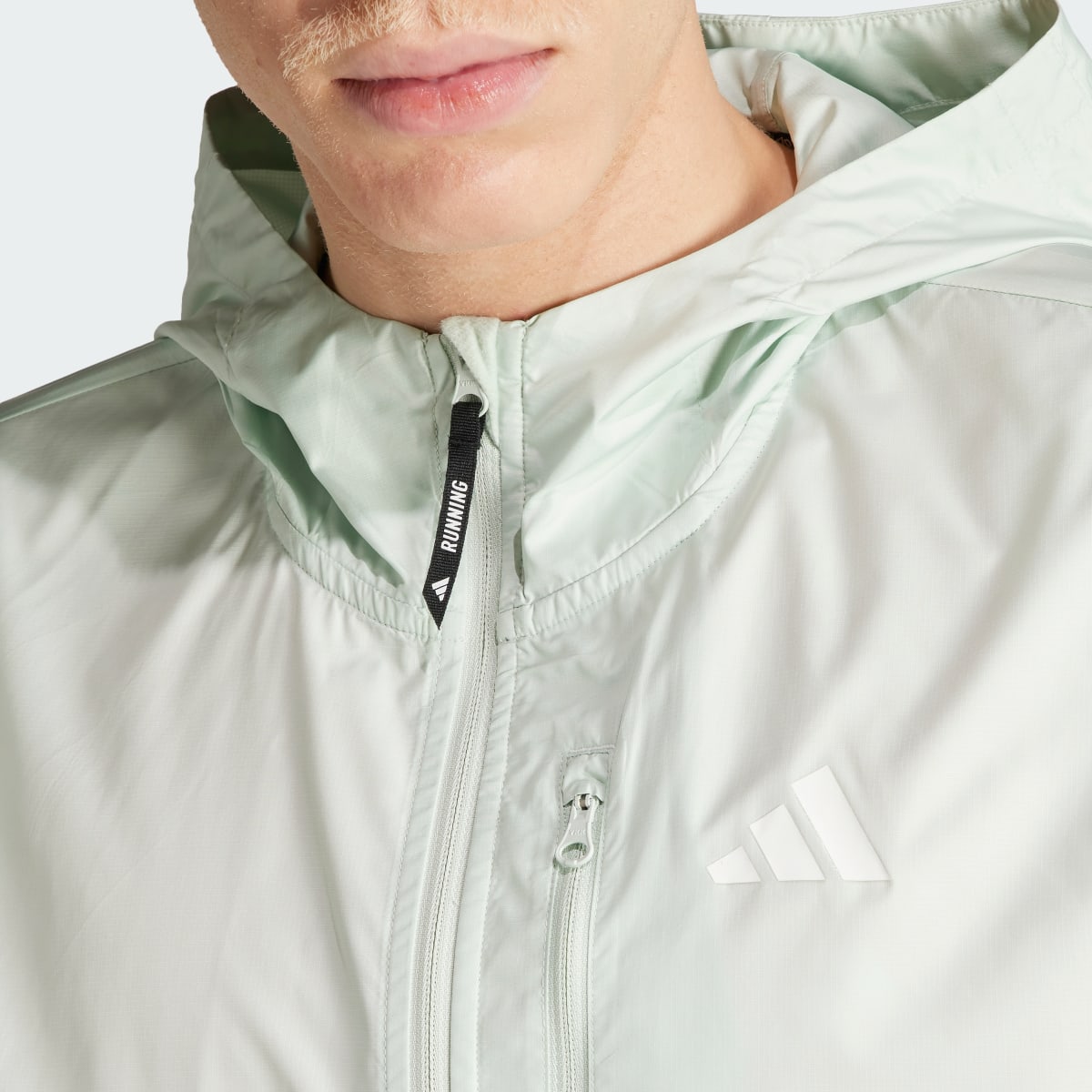 Adidas Own the Run Jacket. 6