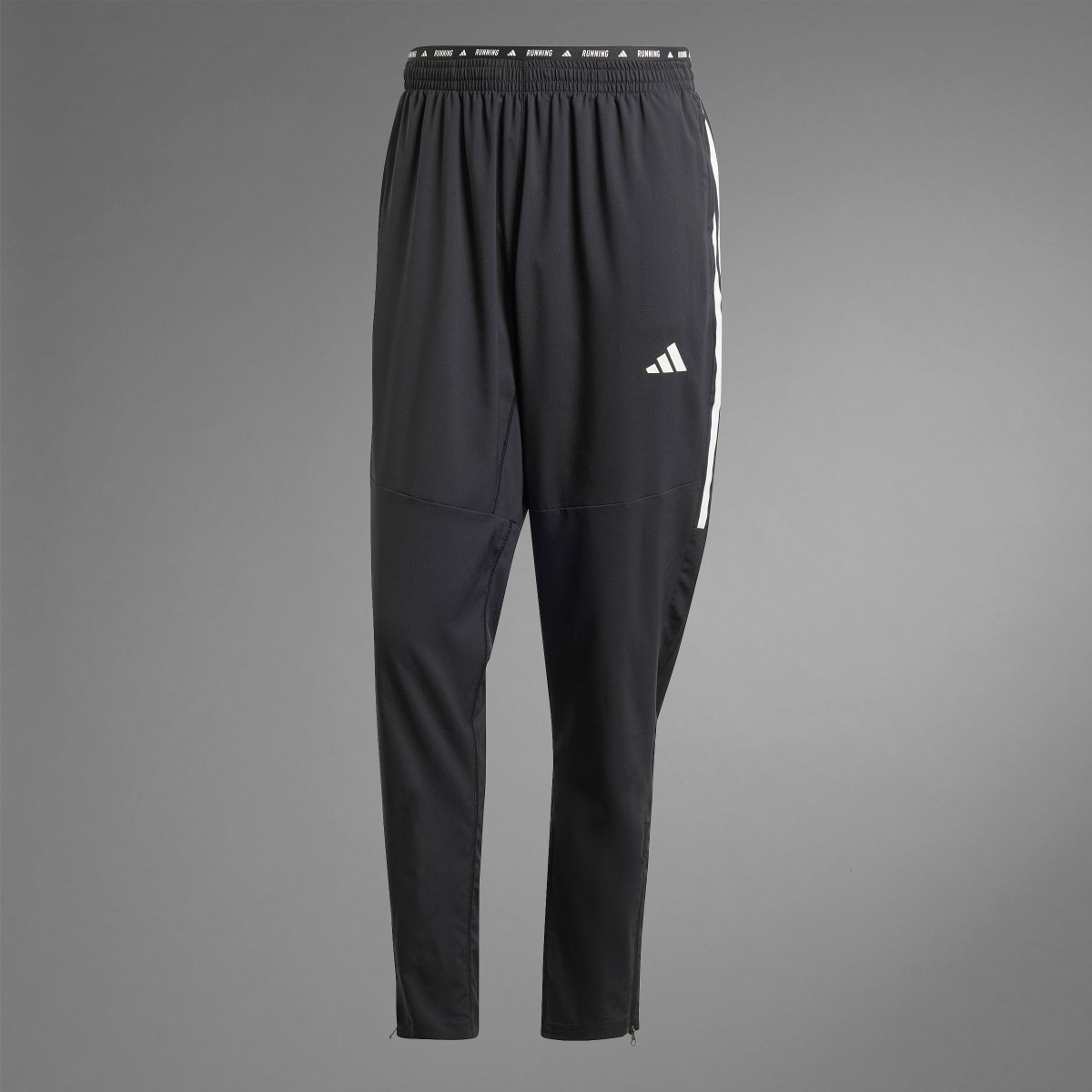 Adidas Pantaloni Own the Run 3-Stripes. 9
