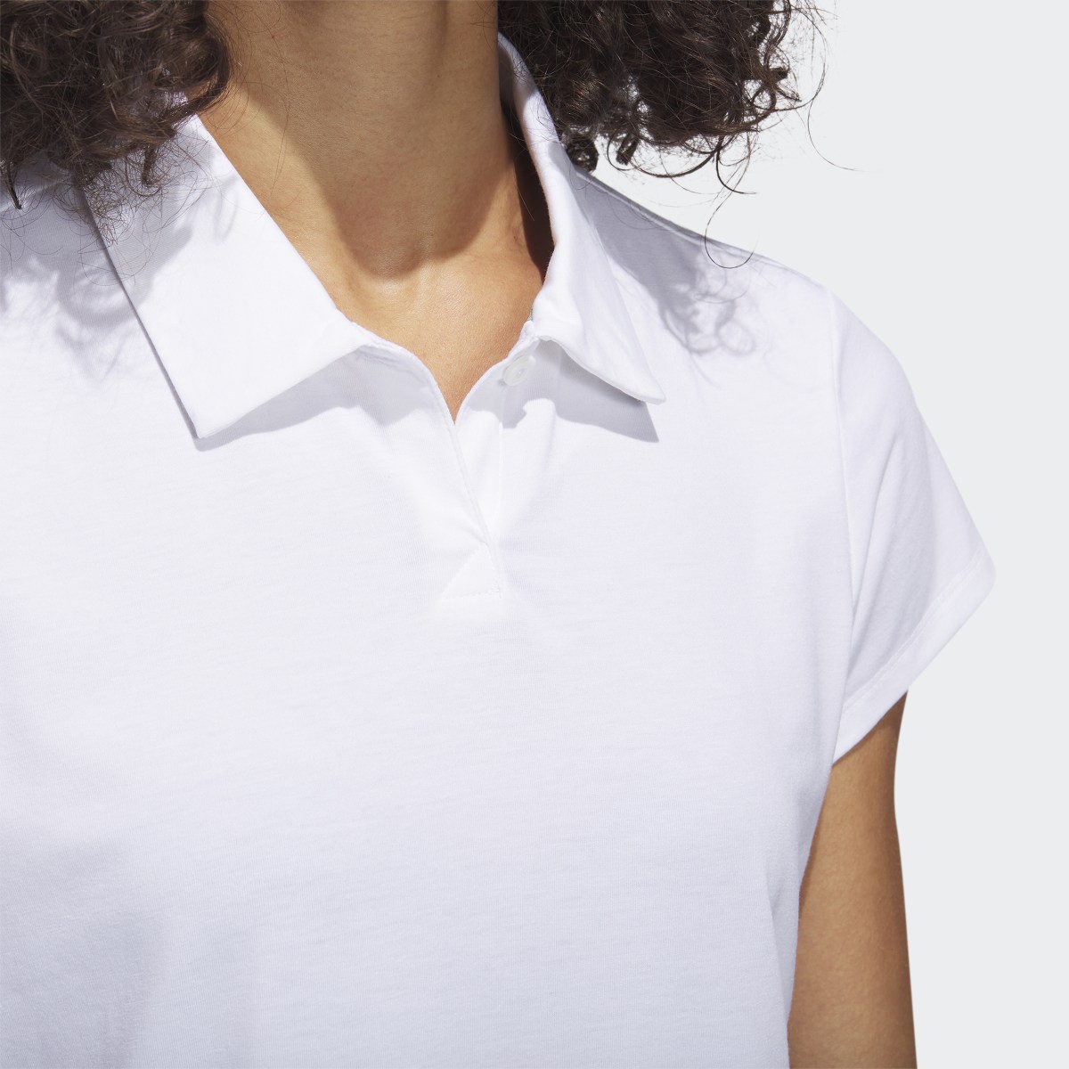 Adidas Playera Polo Go-To Heathered. 6