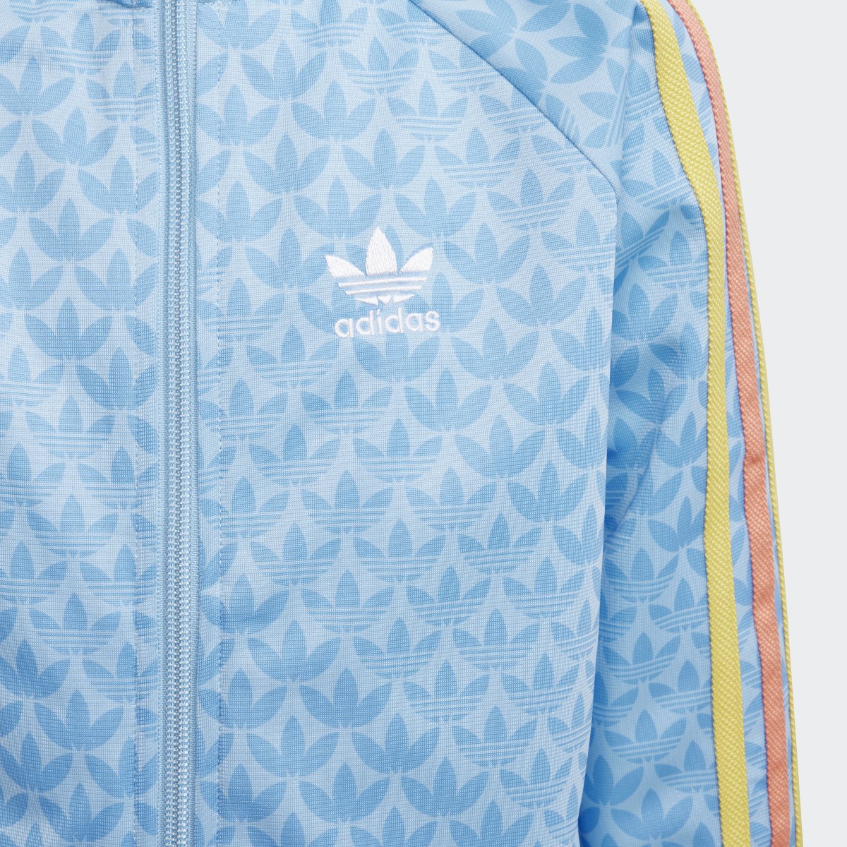 Adidas Monogram Print Track Suit. 9