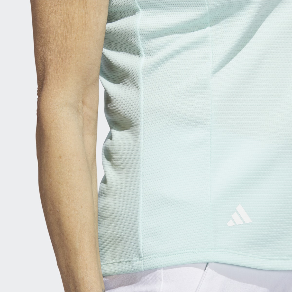 Adidas Textured Golf Polo. 7