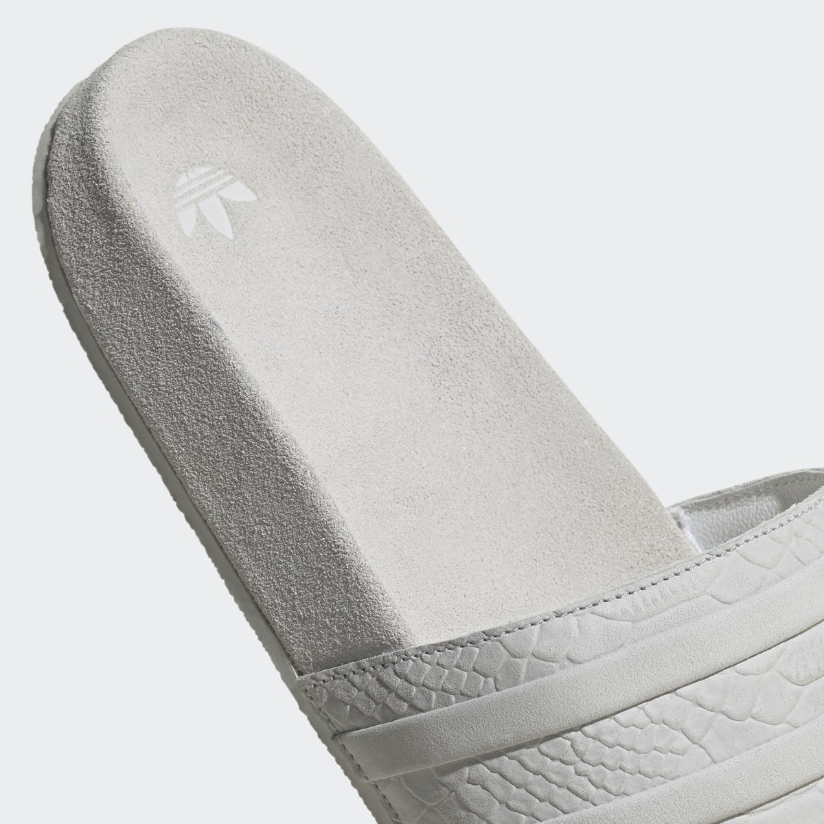 Adidas adilette Slides. 9