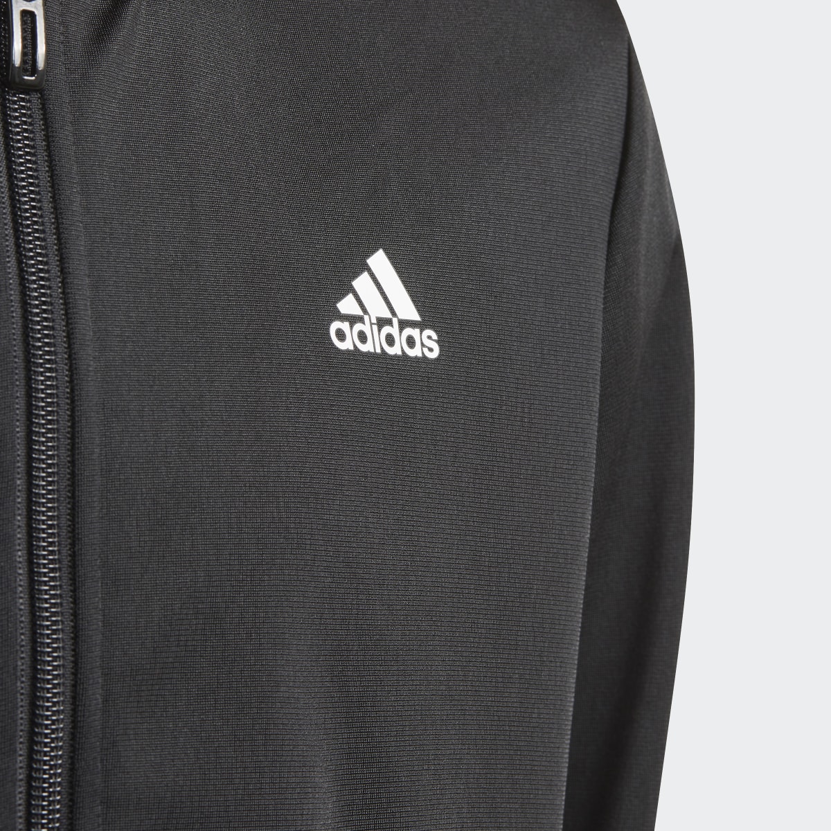 Adidas Essentials Track Suit. 7