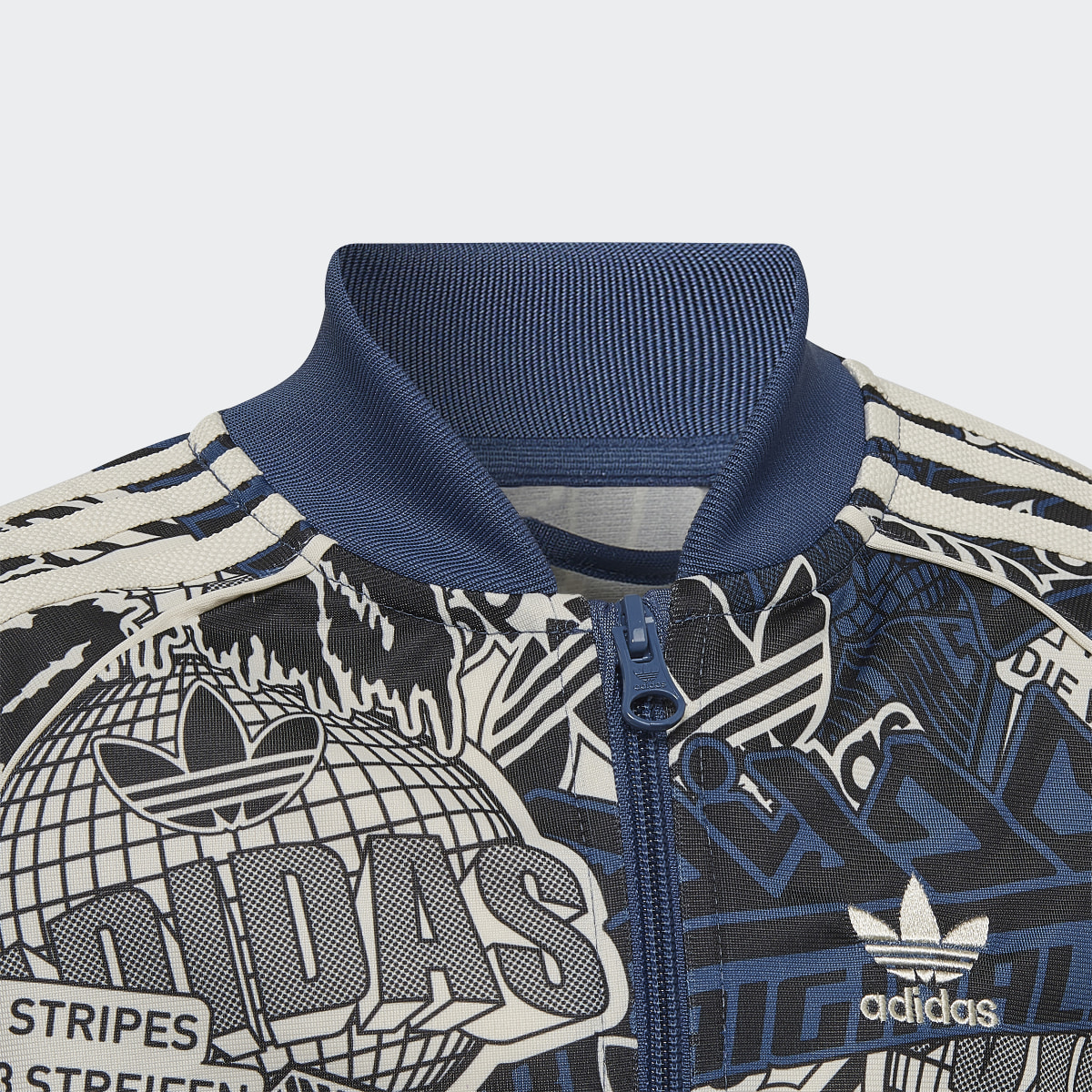 Adidas Allover Print Track Suit. 7