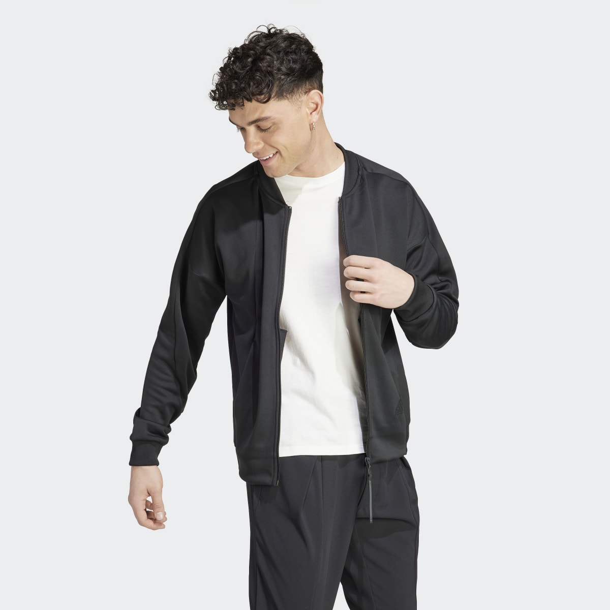 Adidas City Escape AEROREADY Warming Track Jacket. 4