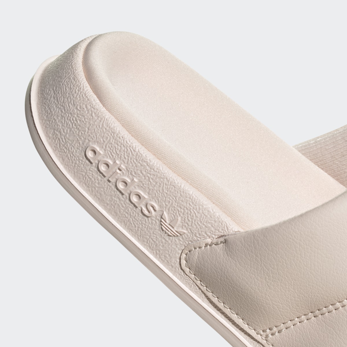 Adidas Adilette Essential Slides. 10