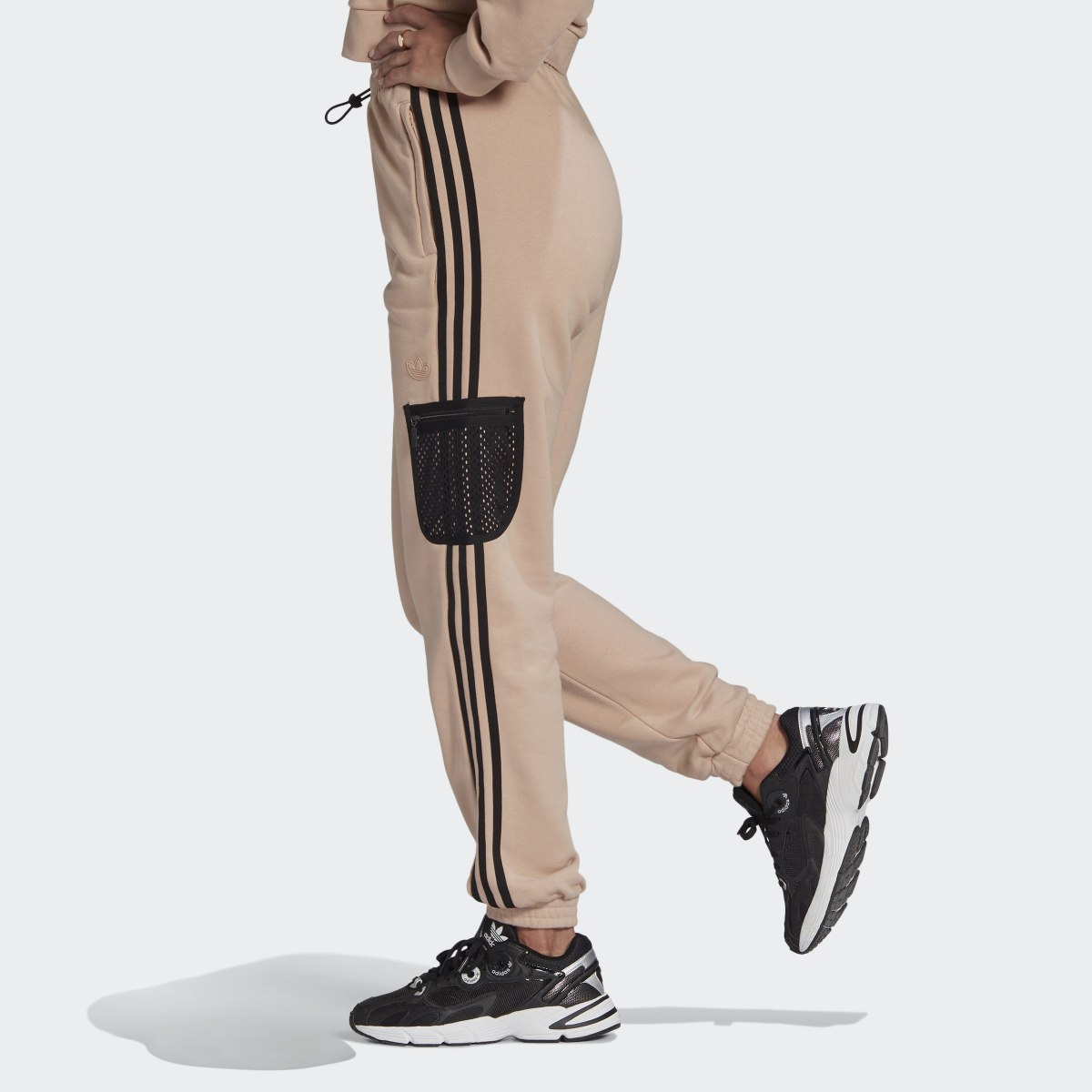 Adidas Pantalon Cuffed. 6