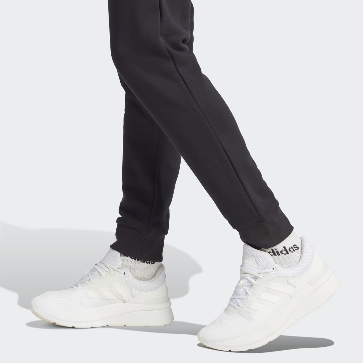 Adidas Essentials Fleece Tapered Cuffed Pants. 6