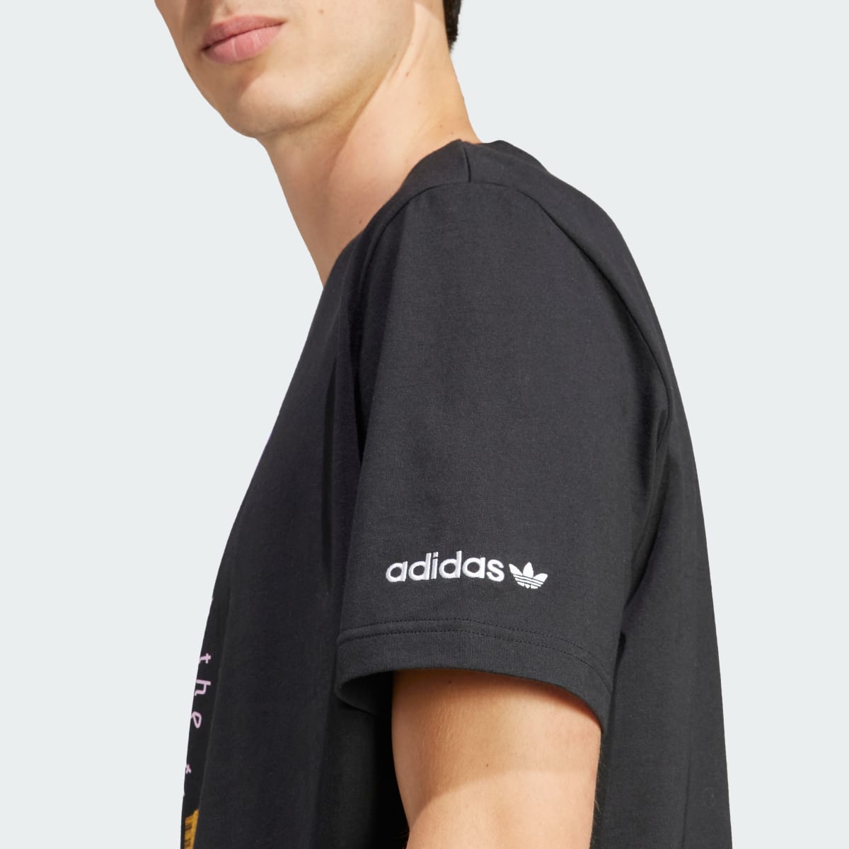 Adidas T-shirt rétro graphique. 7