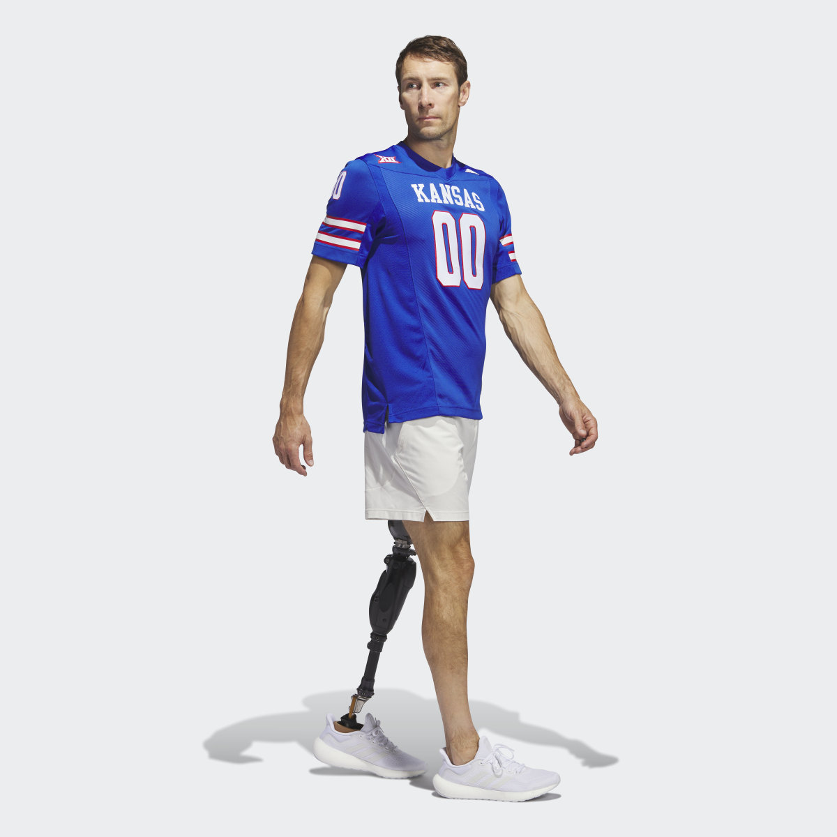 Adidas Kansas Football Off-Field Home Jersey. 4