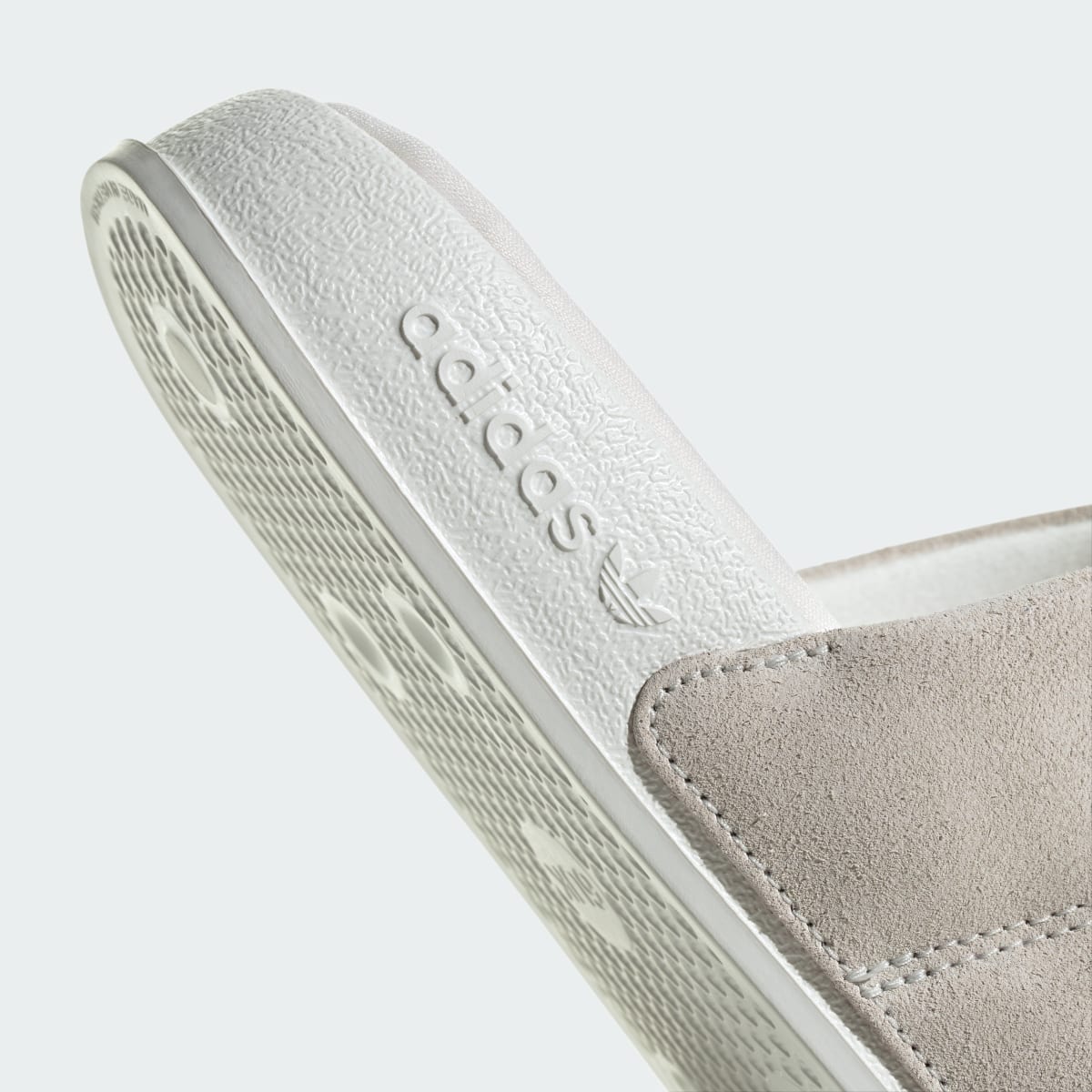 Adidas Adilette Essential Slides. 9