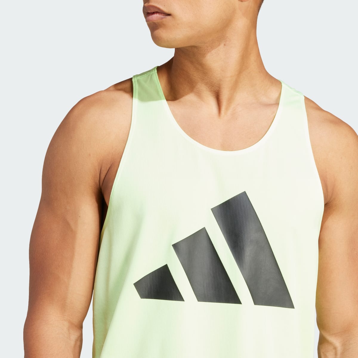 Adidas Playera sin Mangas Run It. 7