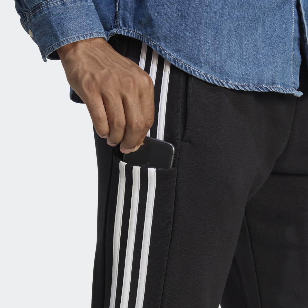 Adidas Essentials French Terry Tapered Cuff 3-Stripes Joggers. 7