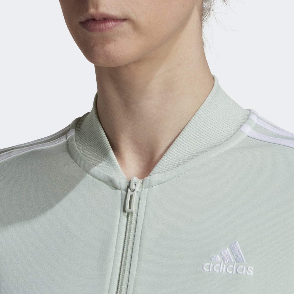 Adidas Essentials 3-Stripes Track Suit. 8