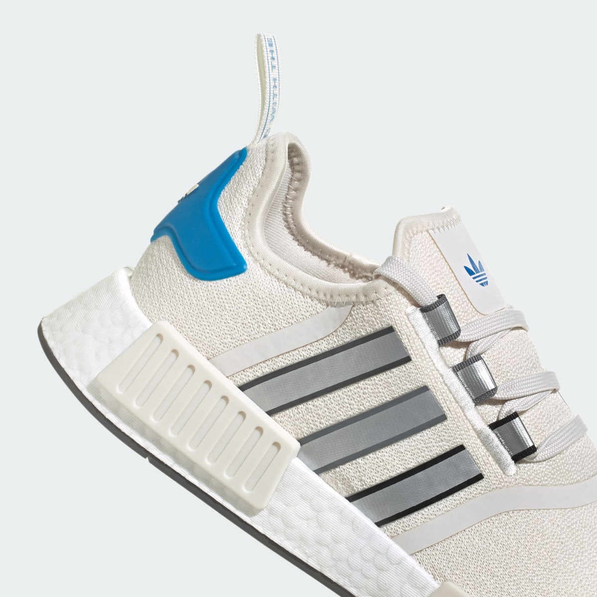 Adidas NMD_R1 Shoes. 11