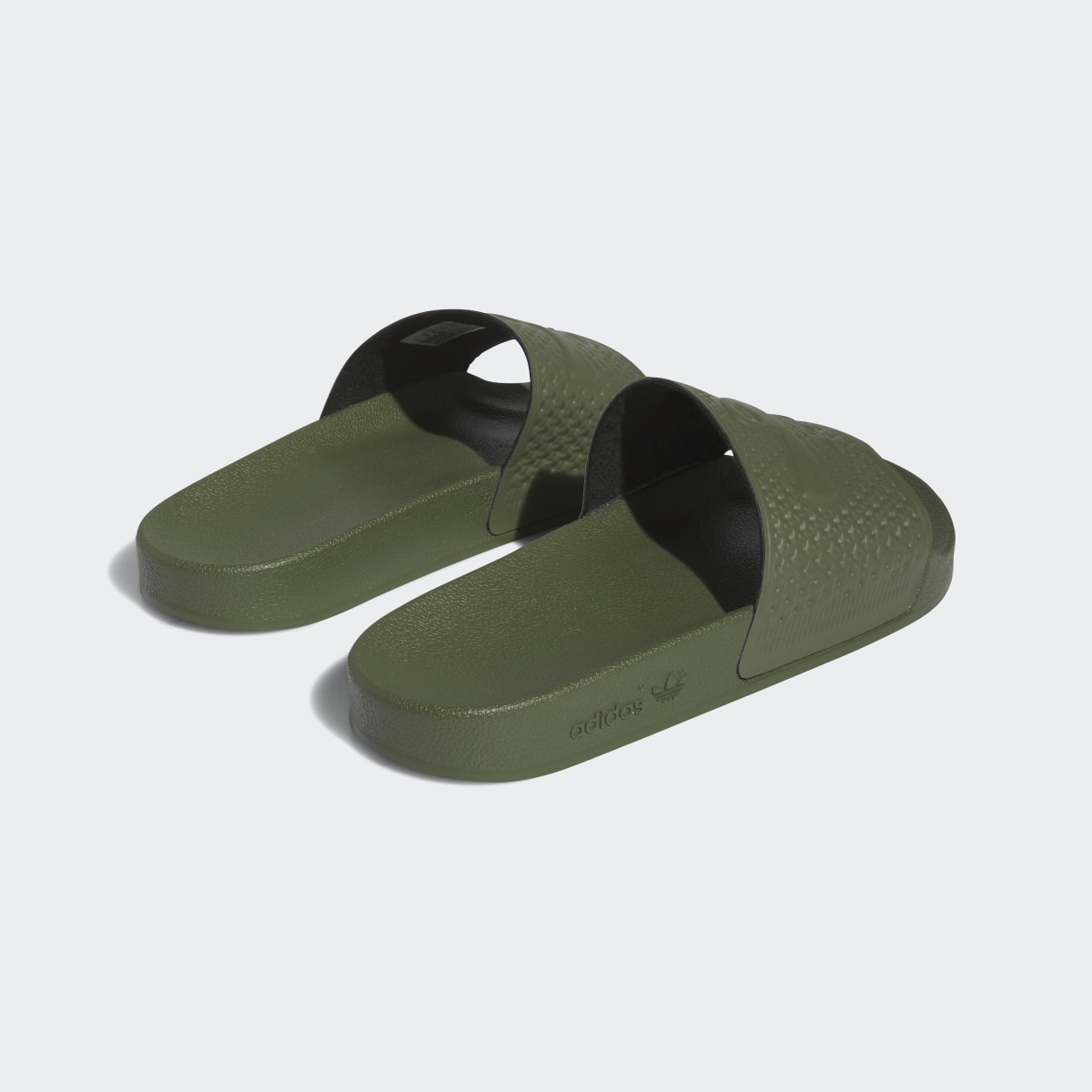 Adidas Shmoofoil Slides. 6