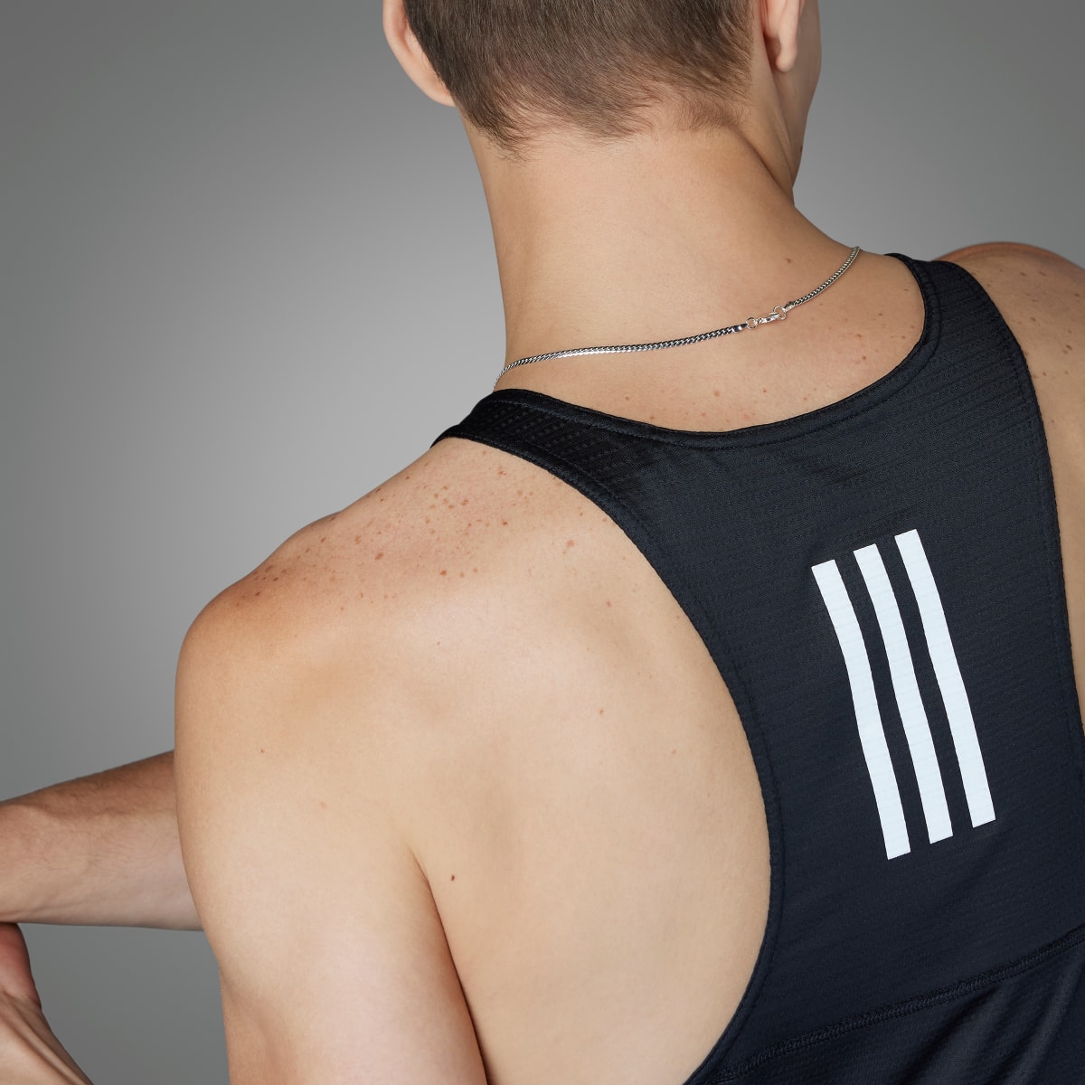 Adidas Own the Run Singlet. 4