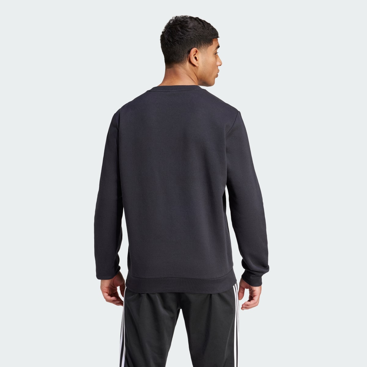 Adidas Essentials Fleece Sweatshirt. 4