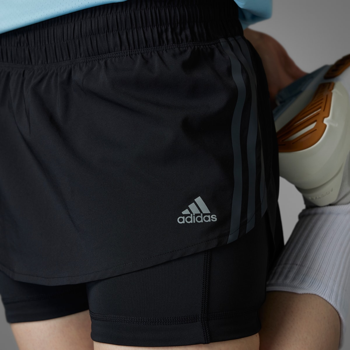 Adidas Jupe-short de running Run Icons 3 bandes. 4