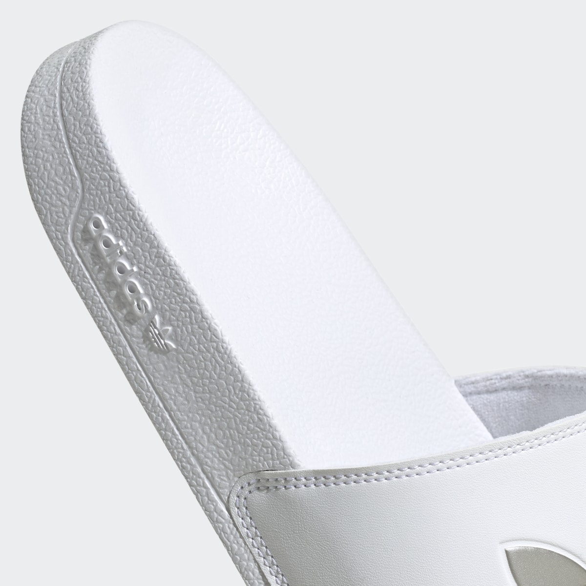 Adidas Chancla Adilette Lite. 10