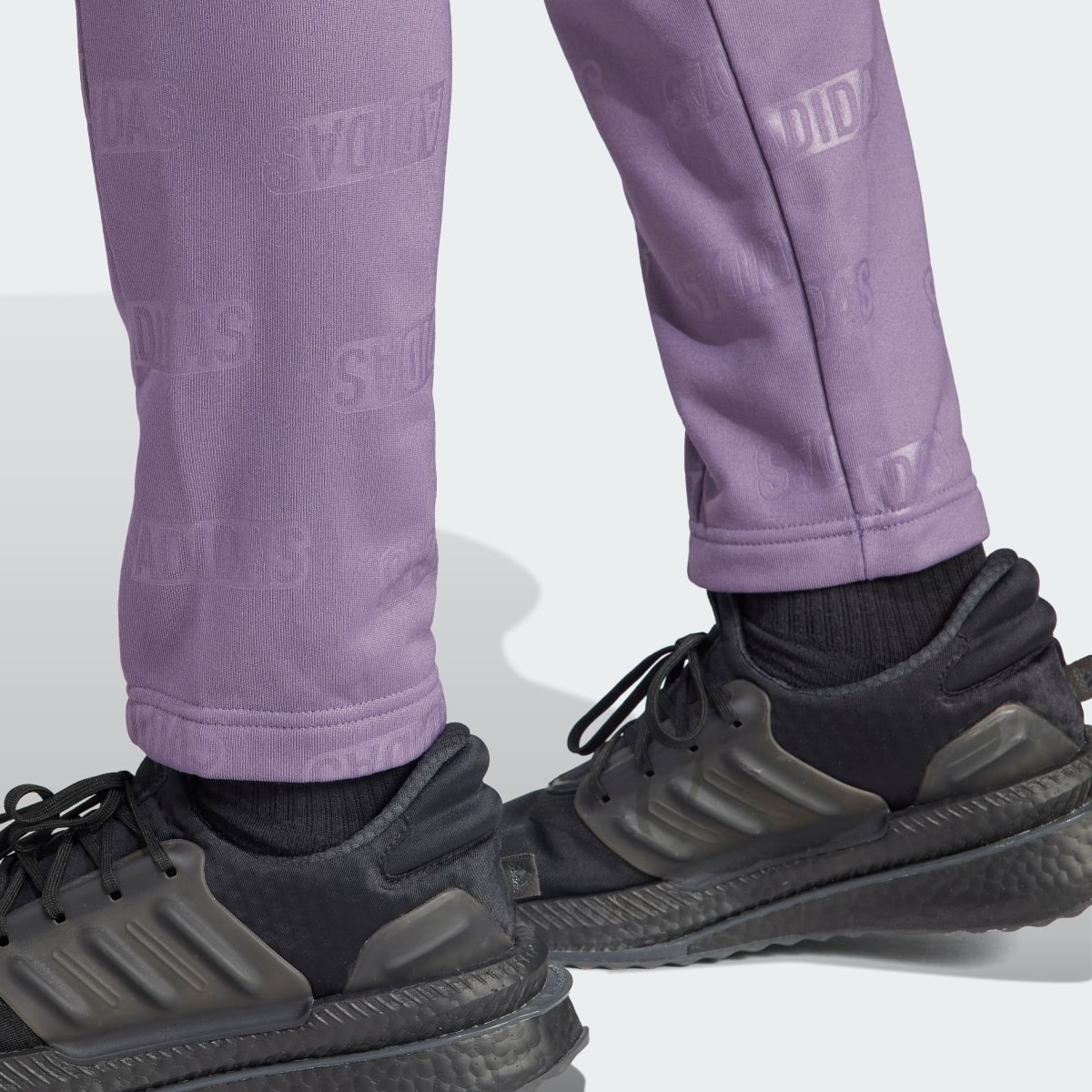 Adidas Embossed adidas Polar Fleece Tapered Pants. 6