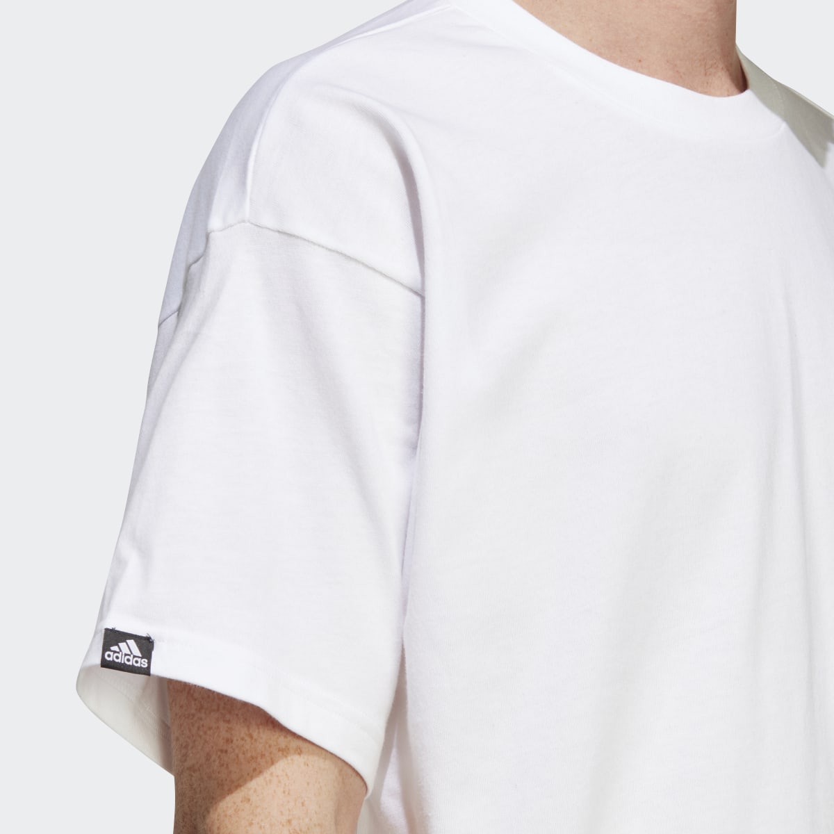 Adidas Graphic T-Shirt. 6
