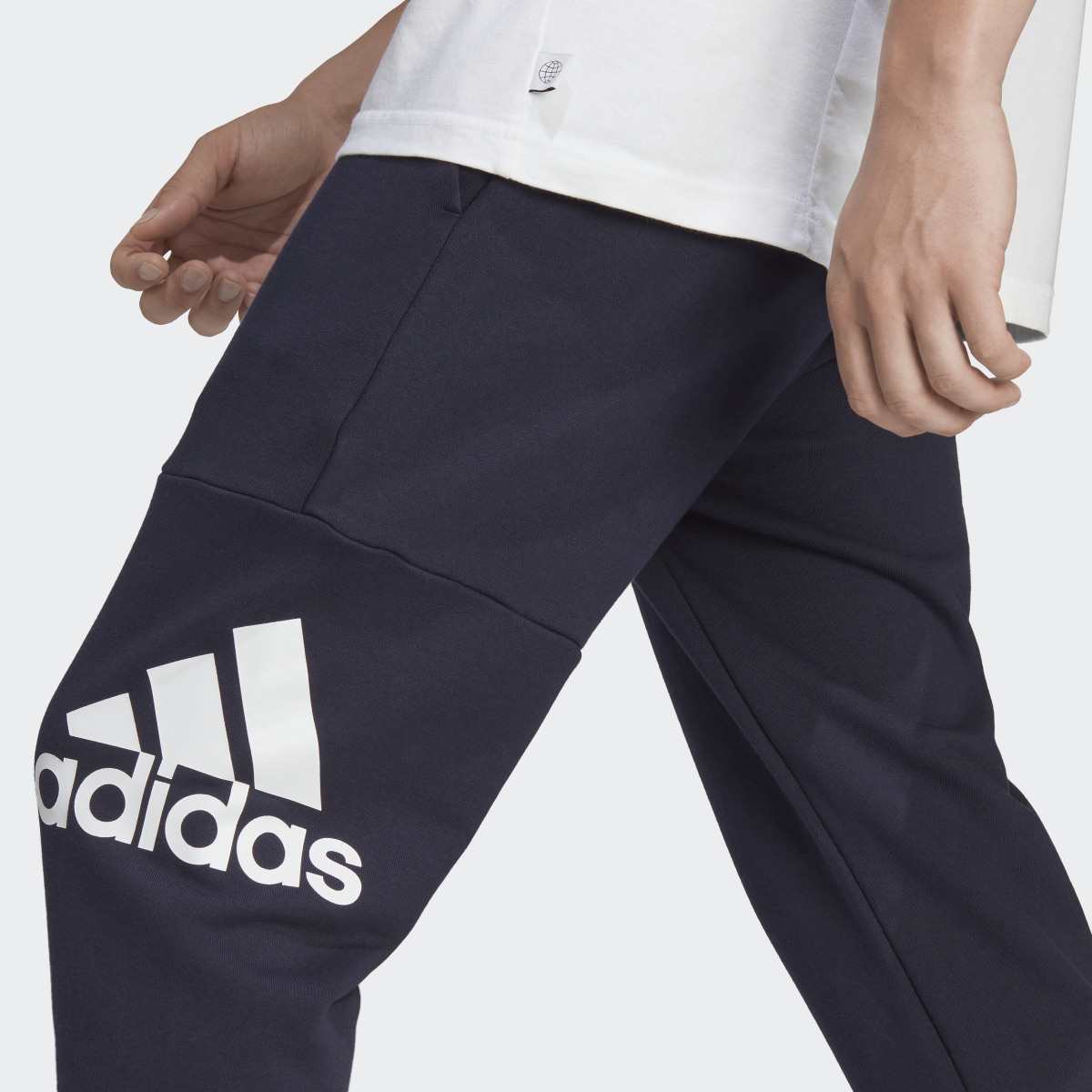 Adidas Essentials French Terry Tapered Cuff Logo Hose. 5