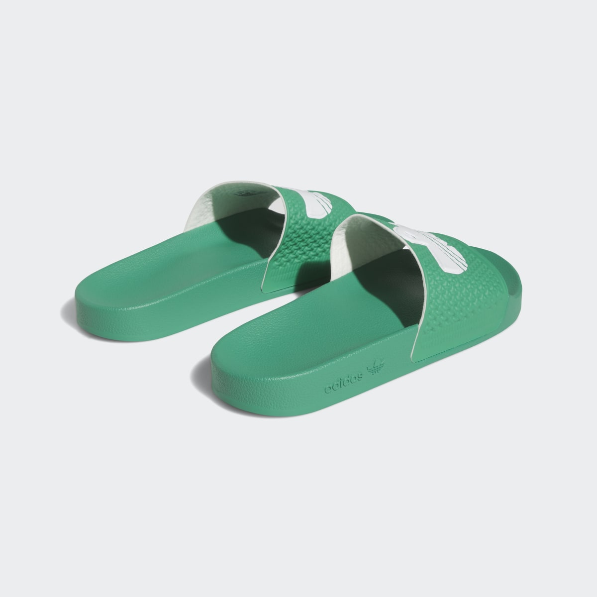 Adidas Shmoofoil Slides. 6