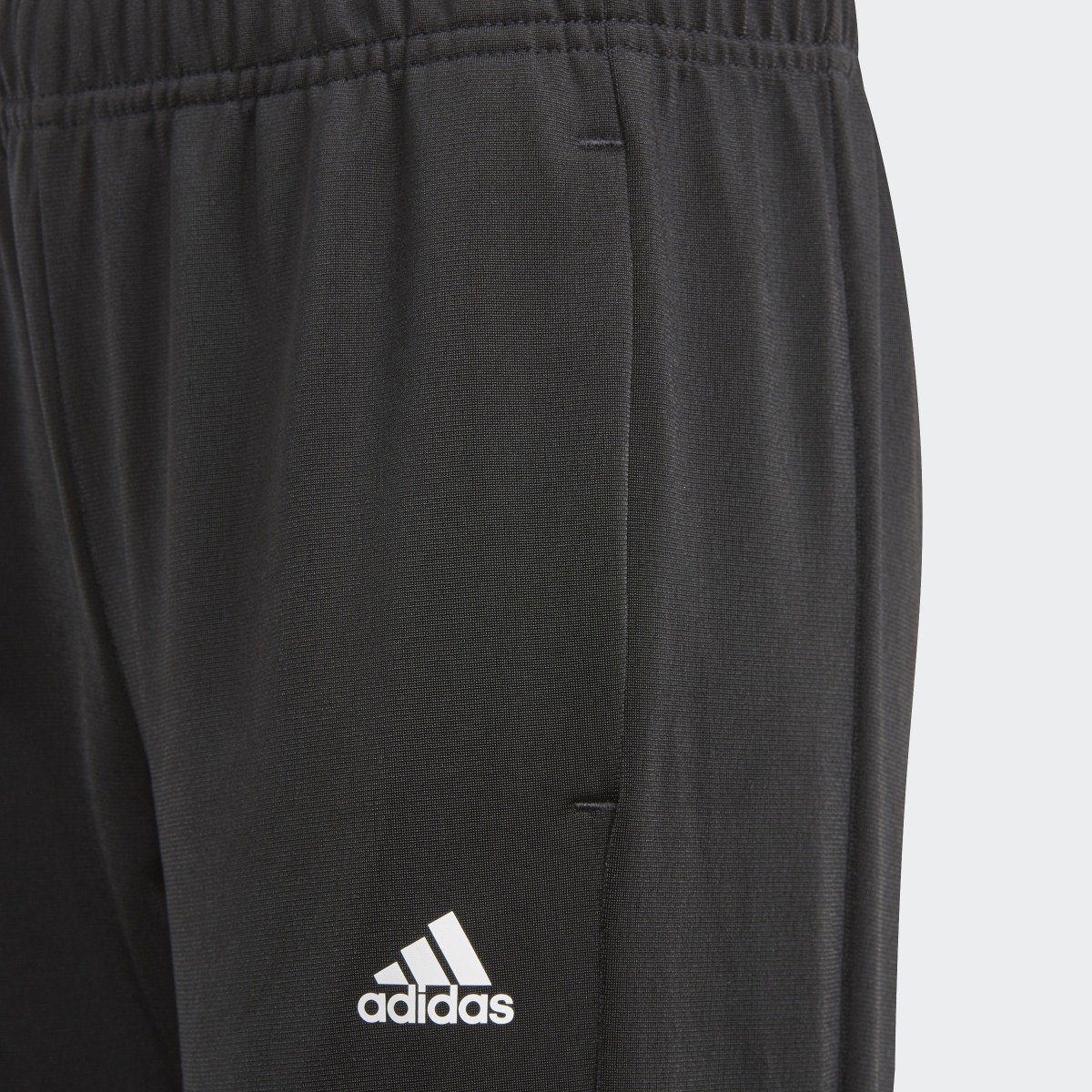 Adidas Essentials Track Suit. 6