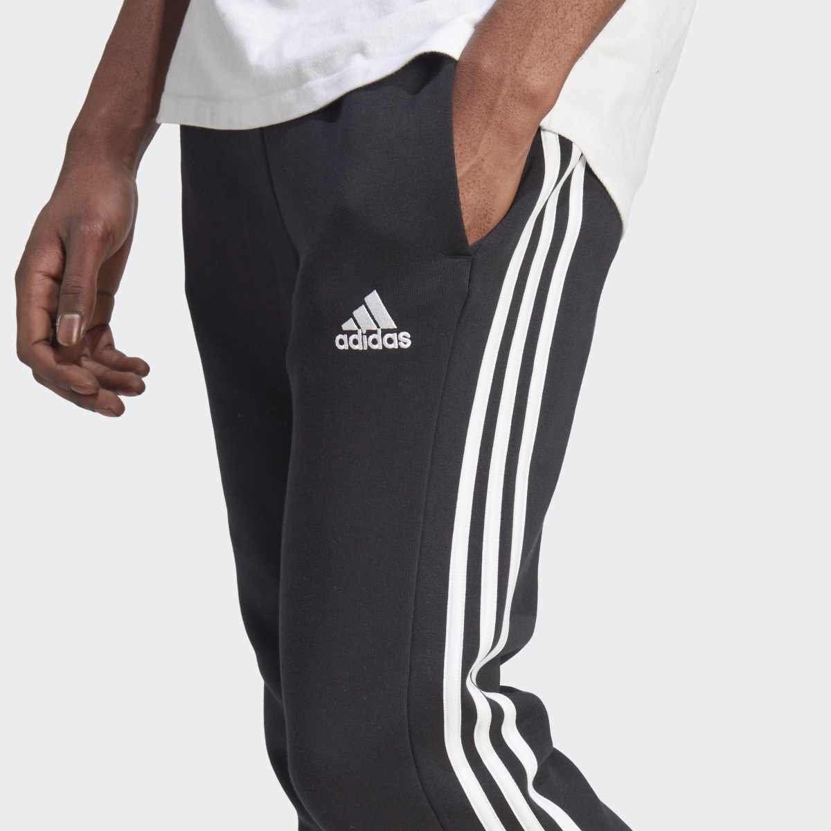 Adidas Essentials Fleece 3-Stripes Tapered Cuff Joggers. 5