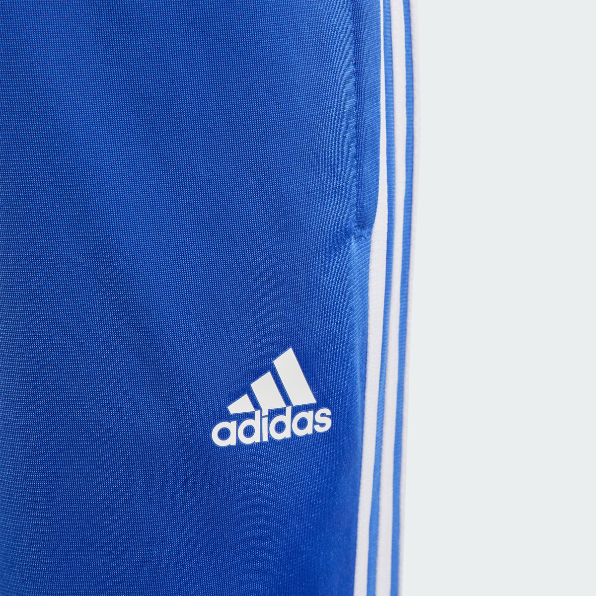 Adidas Essentials 3-Stripes Shiny Track Suit. 7