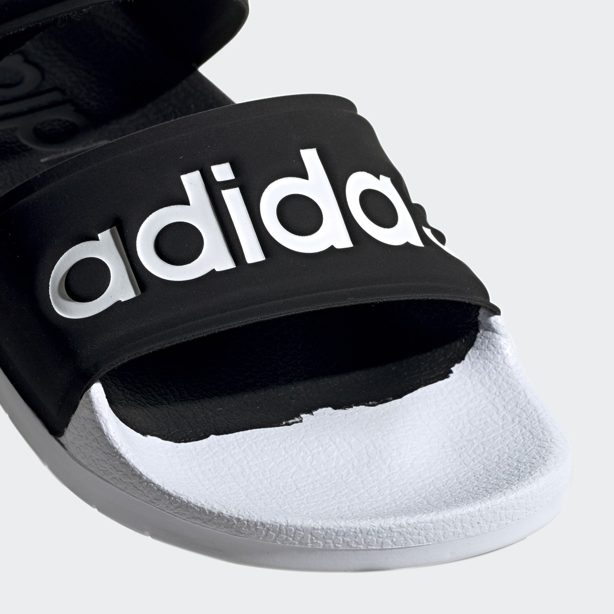 Adidas Claquette Adilette. 8