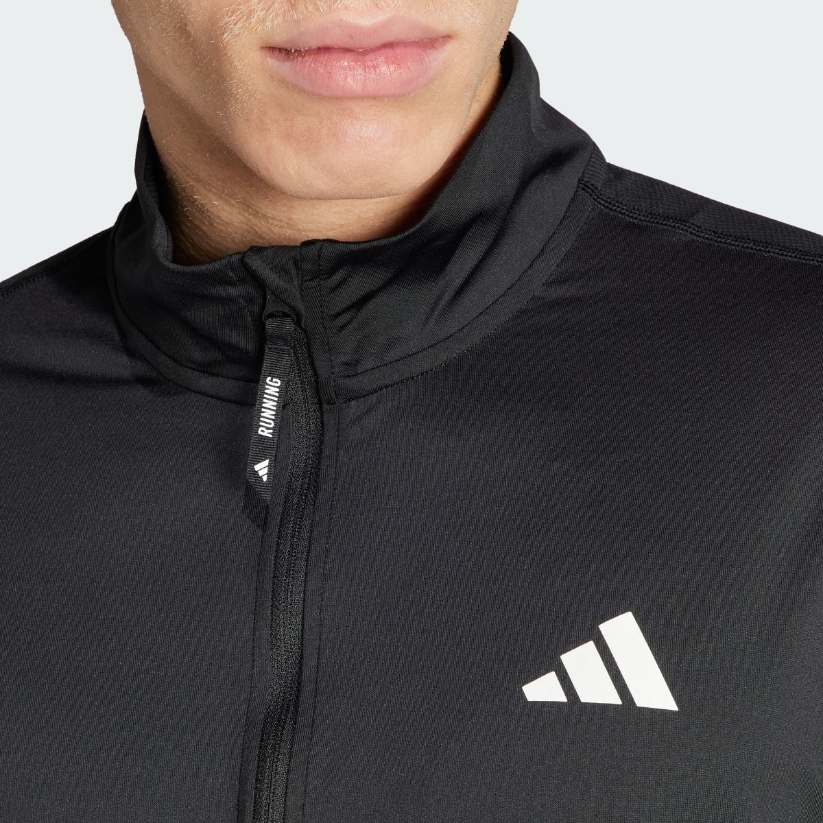 Adidas Veste demi-zip Own the Run. 6