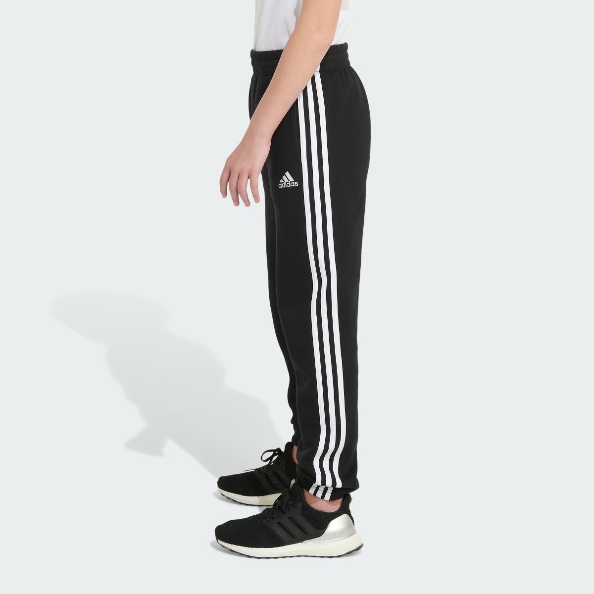 Adidas Elastic Waistband Essential 3-Stripe Fleece Jogger. 5