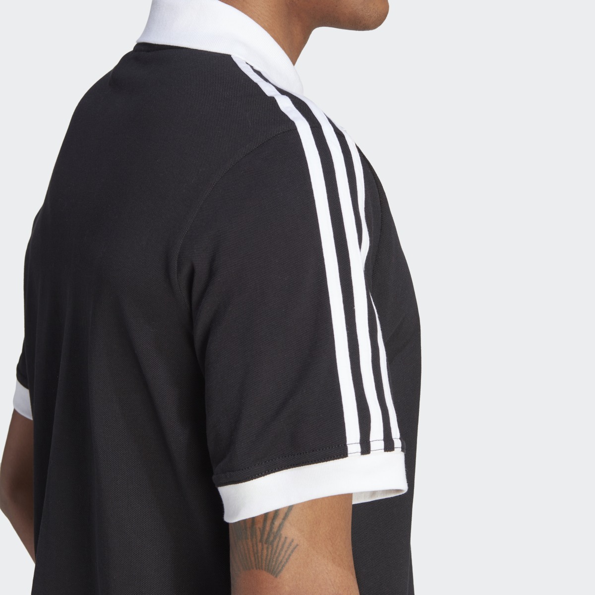 Adidas adicolor Classics 3-Streifen Poloshirt. 7