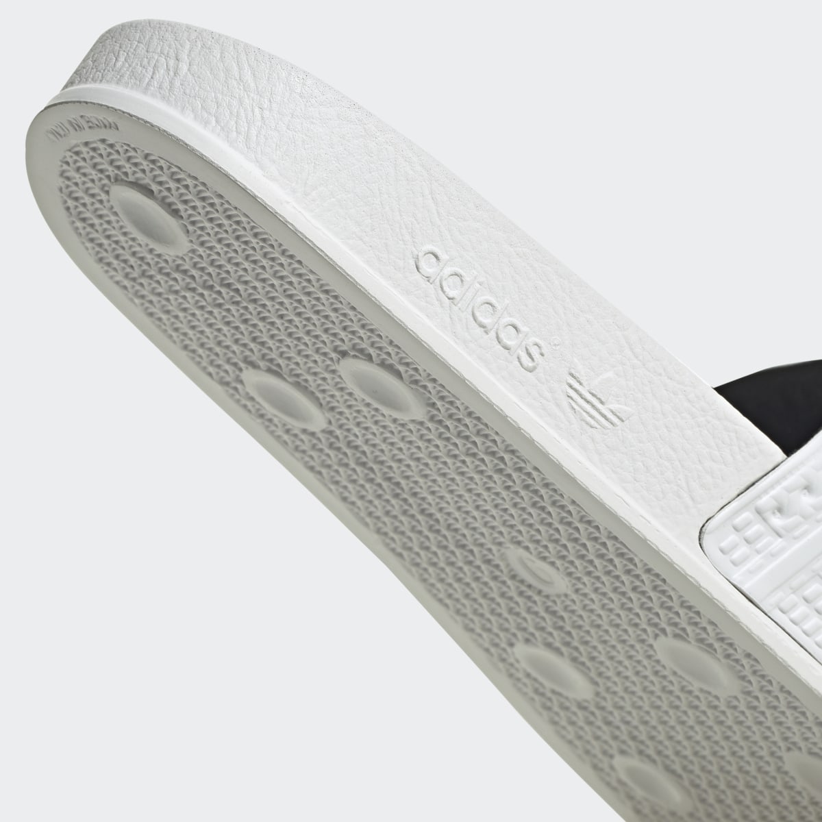 Adidas adilette Slides. 9
