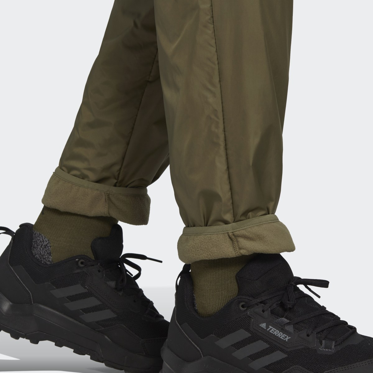 Adidas Multi Primegreen Windfleece Hose. 8