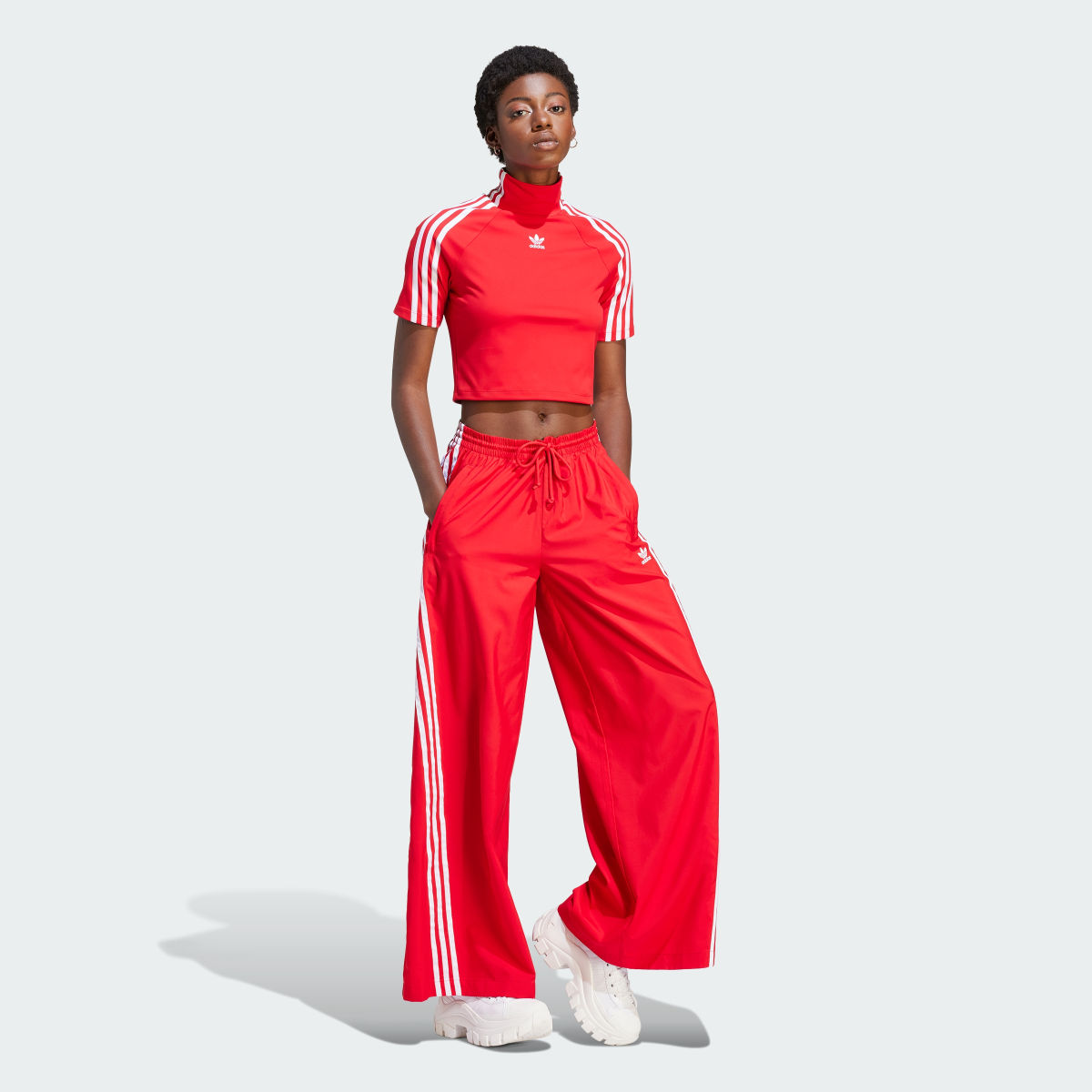 Adidas TIGHT SS TOP. 4