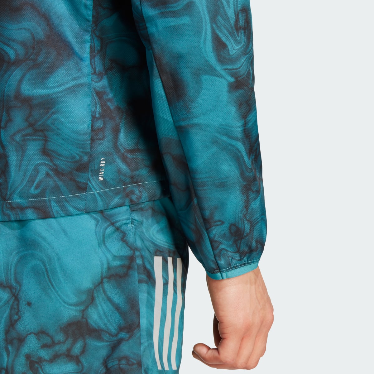 Adidas Own the Run Allover Print Jacket. 6