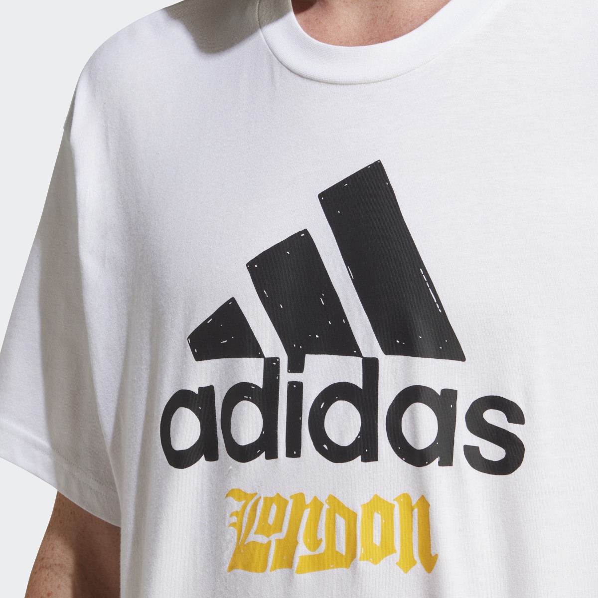 Adidas Graphic T-Shirt. 5